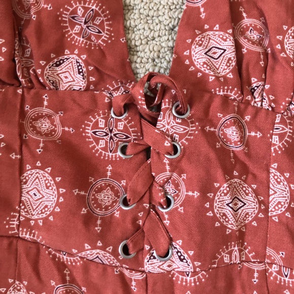 Rust Red and Yellow Halter Ankle Jumpsuit - Picture 2 of 5